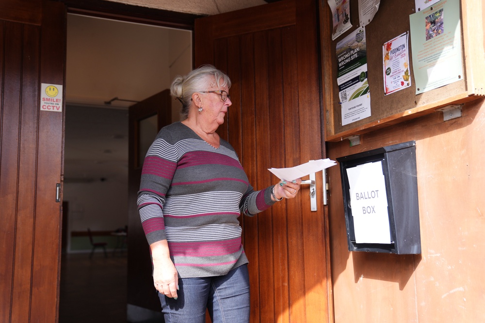 A local resident casts their vote in the ballot box (Ben Whitley/PA) (PA Wire)