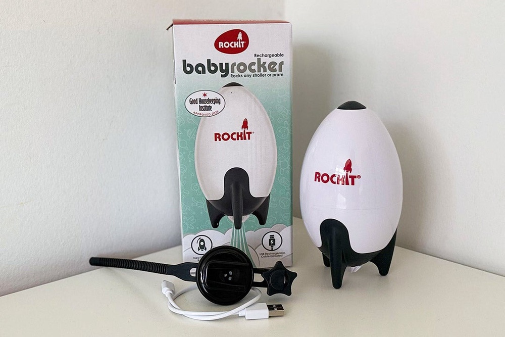 The small, portable rocker attaches to your pram or pushchair and gently moves it for you (Sarah Jones/The Independent)