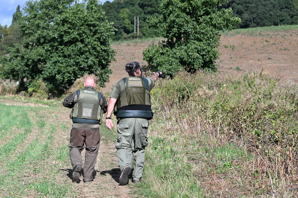 Environment Agency officers join police officers as they continue their search (PA)