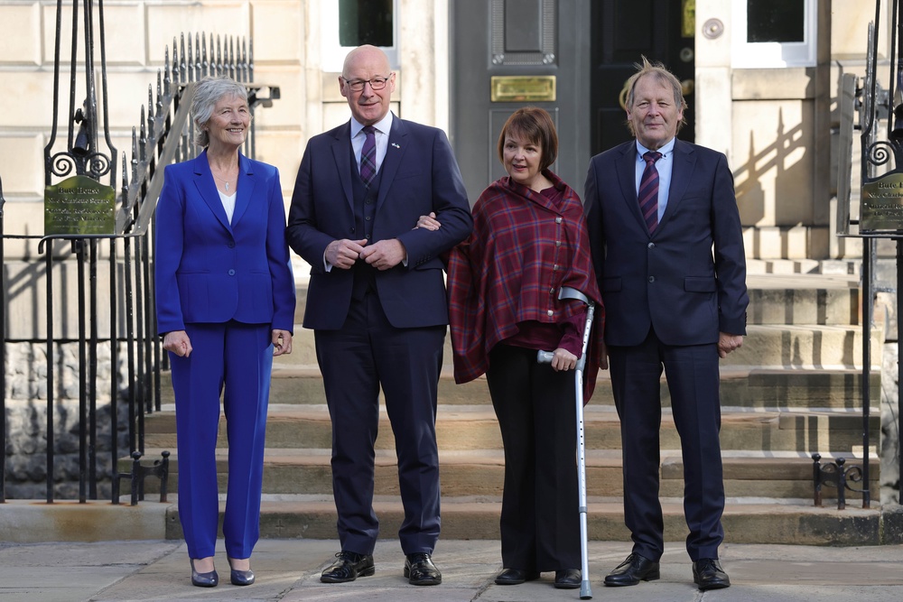 John Swinney and his wife Elizabeth Quigley, both centre, greeted Irish President Catherine Connolly and her husband Brian McEnery outside Bute House (Steve Welsh/PA) (PA Wire)