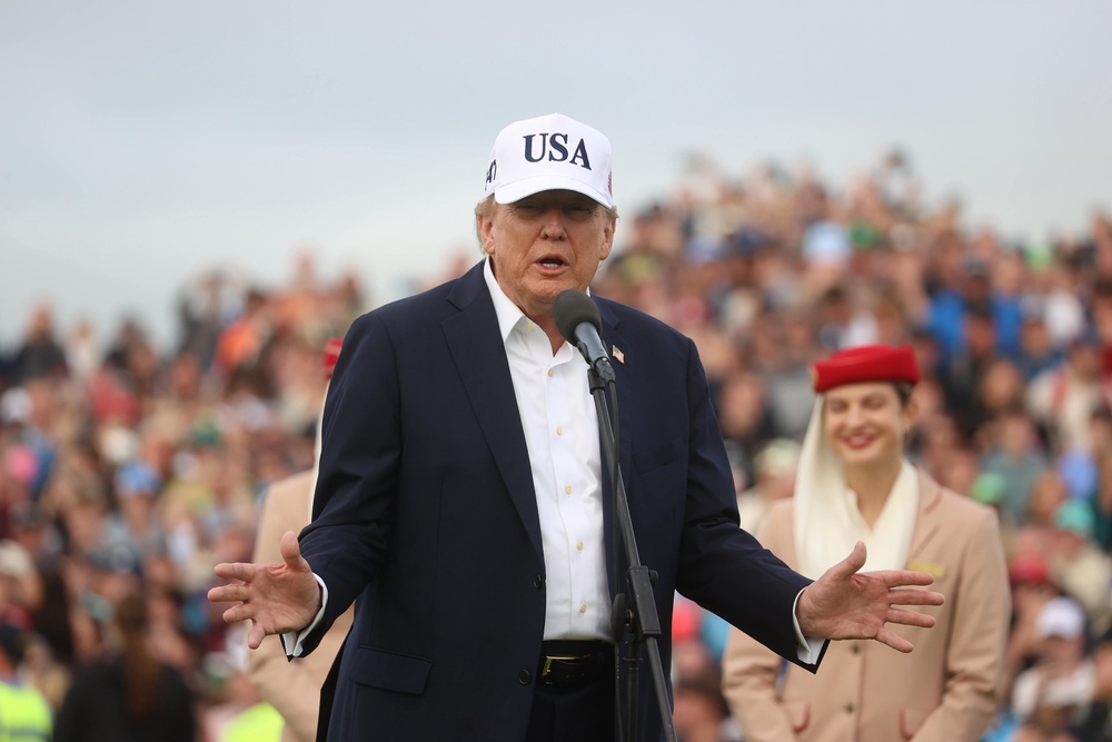 The US president claimed Irish unification was inevitable as he spoke to reporters alongside Taoiseach Micheál Martin, adding it “may as well happen now” (PA)