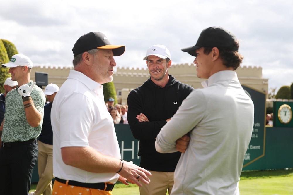 Gareth Bale interacts with Zak Brown and Lando Norris during the Pro-Am prior to the BMW PGA Championship at Wentworth Golf Club (Getty)