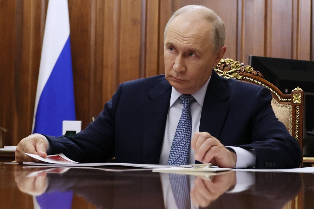 Russian president Vladimir Putin has been accused of launching hybrid attacks across the continent (AP)