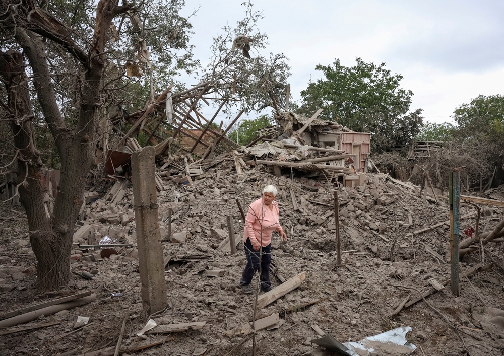 A resident Yana reacts at a site of her private house destroyed during a Russian air strike while she was at a street market, amid Russia's attack on Ukraine, in the frontline city of Kramatorsk, Ukraine September 16, 2026. (Reuters)
