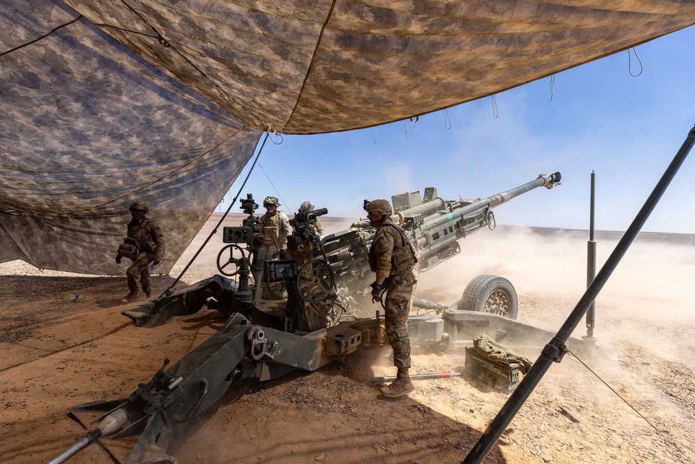Active duty US service members leaked images to CBS News showing Iranian damage to US positions in the Middle East. Pictured: US Army Paratroopers fire an M777 howitzer during a field artillery exercise in the Middle East earlier this summer (US Central Command)