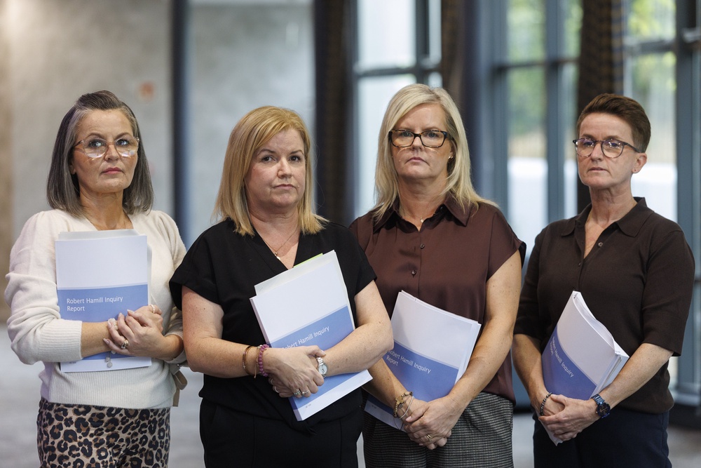 (left to right) Riana Girvan, Diane Hamill, Fiona Ryan and Majella Hamill, sisters of Robert Hamill, at the Armagh City Hotel in Armagh following the publication of the public inquiry report into the death of their brother, who was killed in Portadown in April 1997 (PA) (PA Wire)