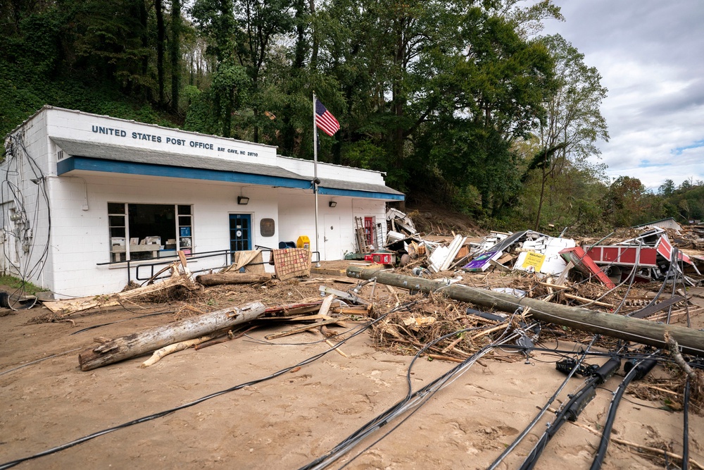 Up to 30 inches (76 centimeters) of rain turned gentle streams into rushing torrents that moved boulders, trees, vehicles, and houses, breaking flood records that had stood for a century (Getty Images)