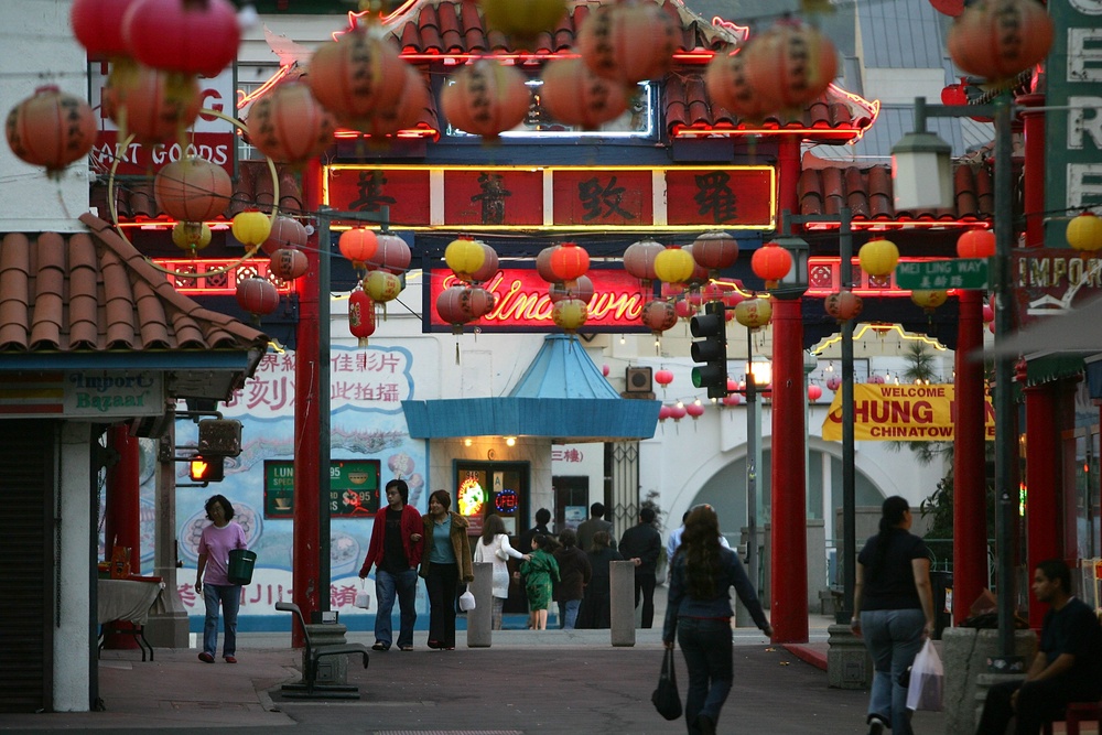 Pedestrians walk through an old section of Chinatown in Los Angeles (Getty)