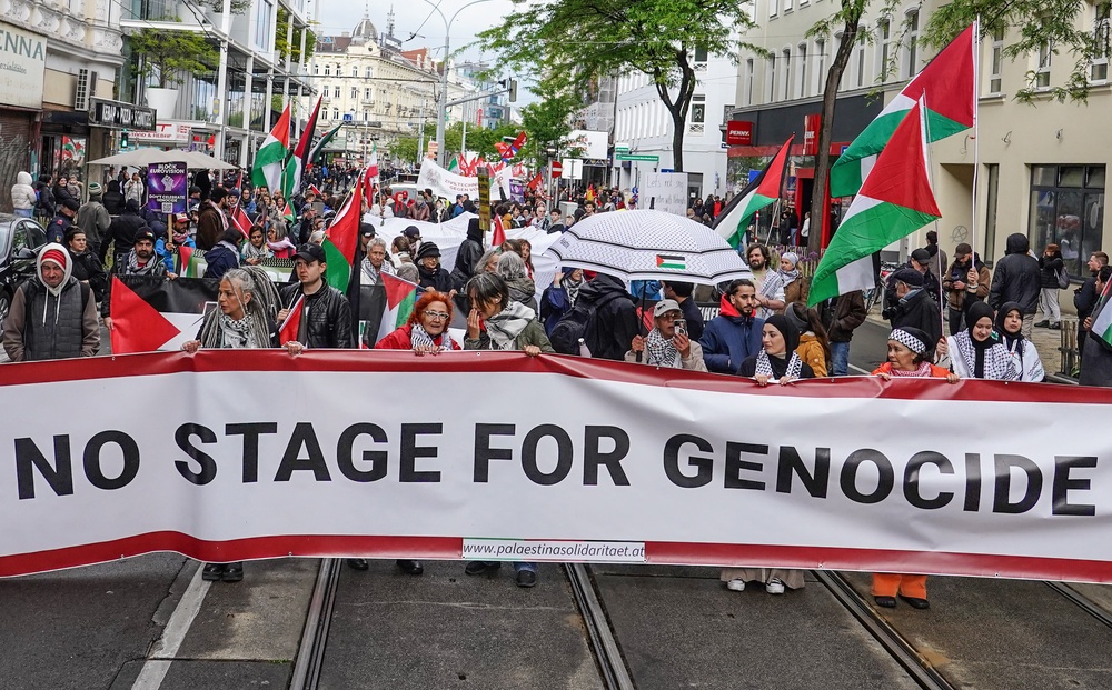 People take part in a No Stage For Genocide protest to demonstrate against Israel’s participation (PA) (PA Wire)