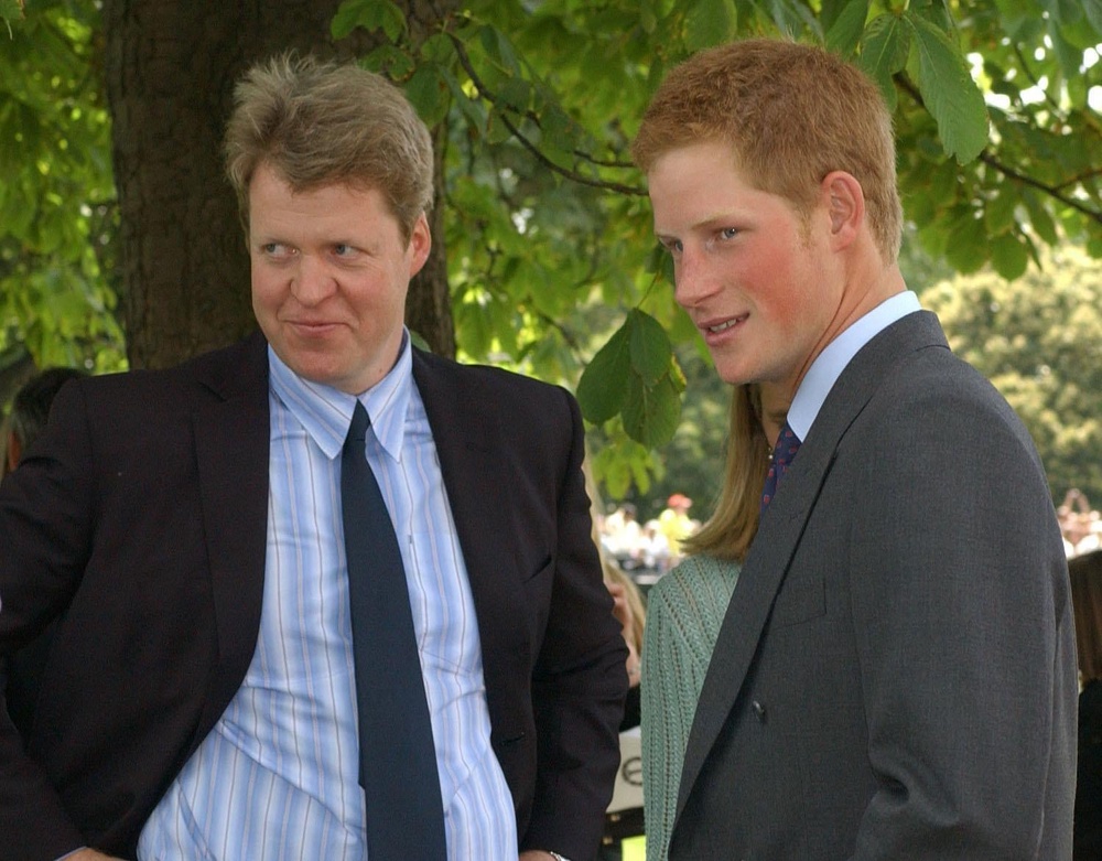 With his nephew Prince Harry at the opening of the Diana memorial fountain (PA)