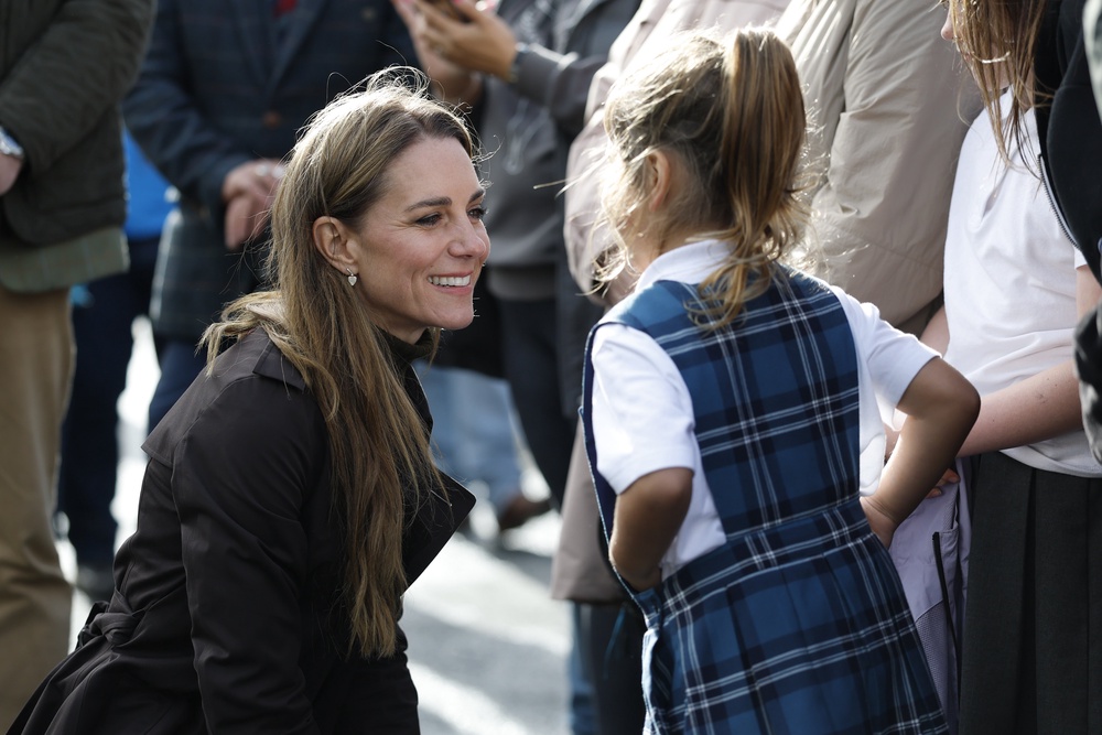 The Princess of Wales (known as the Duchess of Rothesay when in Scotland) speaks to a young girl following a visit to the community-owned Anchor Tavern Pub & Hub in Port Bannatyne (Jeff J Mitchell/PA) (PA Wire)