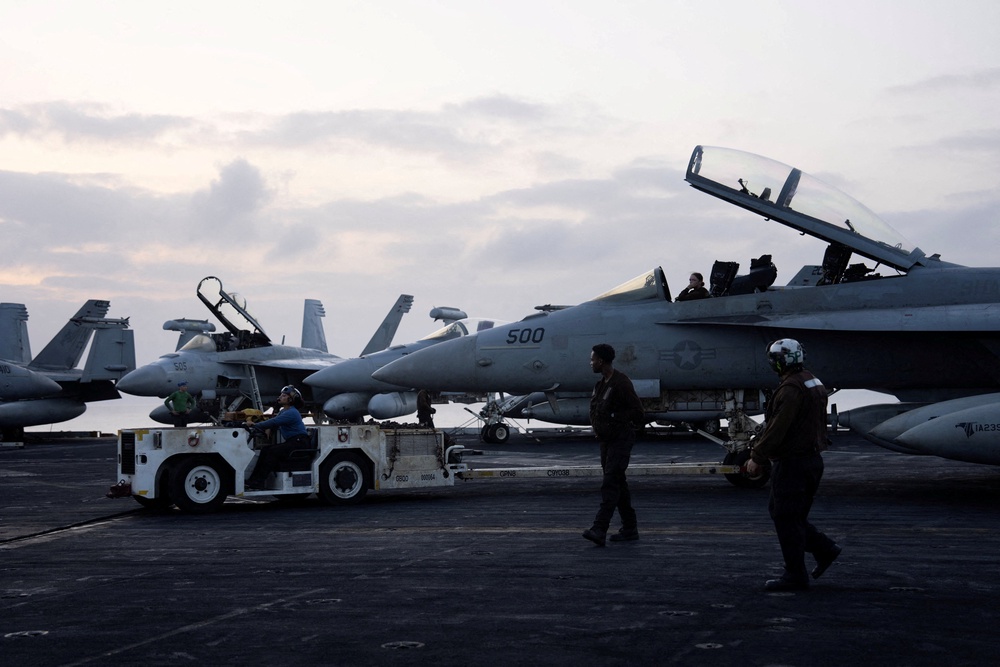 A fighter jet sits on the flight deck of the USS George Washington in the Arabian Sea, September 11, 2026. The aircraft carrier, capable of carrying more than 5,000 personnel, is enforcing a U.S. naval blockade against Iran and providing cover for commercial vessels transiting the Strait of Hormuz (Reuters)