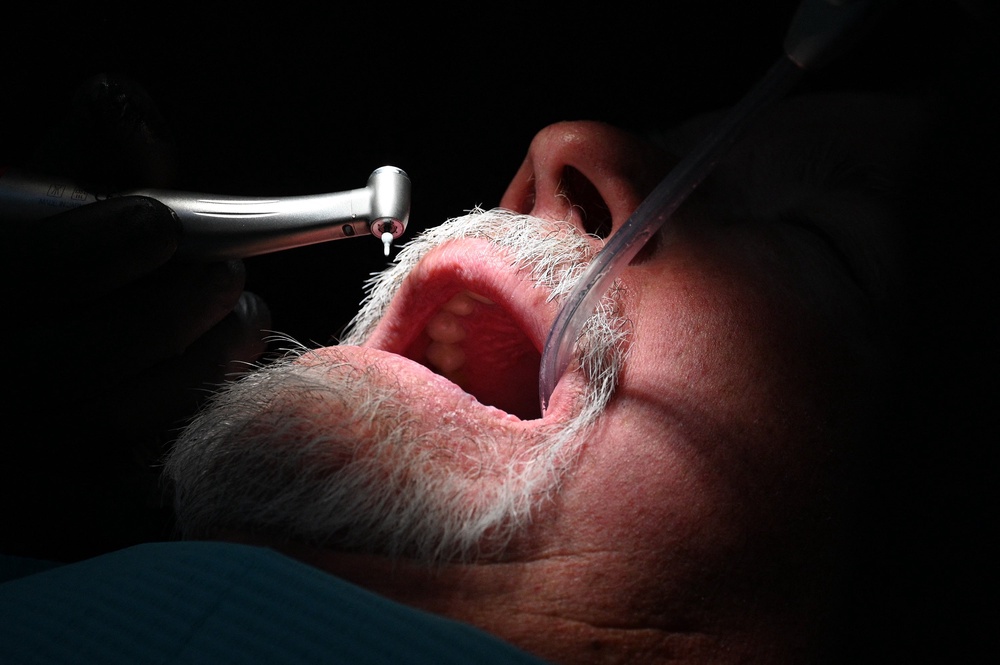 A dentist performs dental work for an American patient at the Rubio Dental Group offices in Los Algodones, Mexico (AFP via Getty Images)