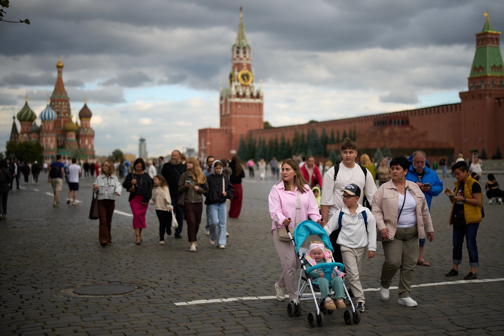 People walk through Red Square in Moscow (AP)
