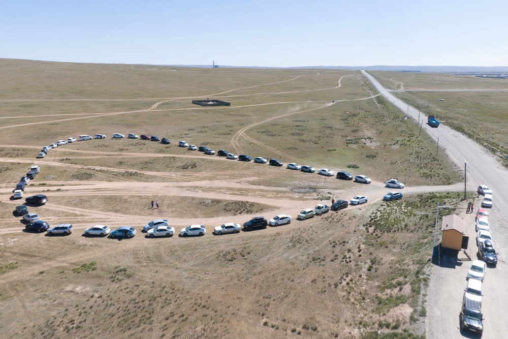 People queueing in their cars to fill up at a gas station in Bagakhangai, Mongolia, which has been gripped in recent months by a relentless fuel shortage after Ukrainian strikes on Russian oil facilities disrupted supply (AFP/Getty)