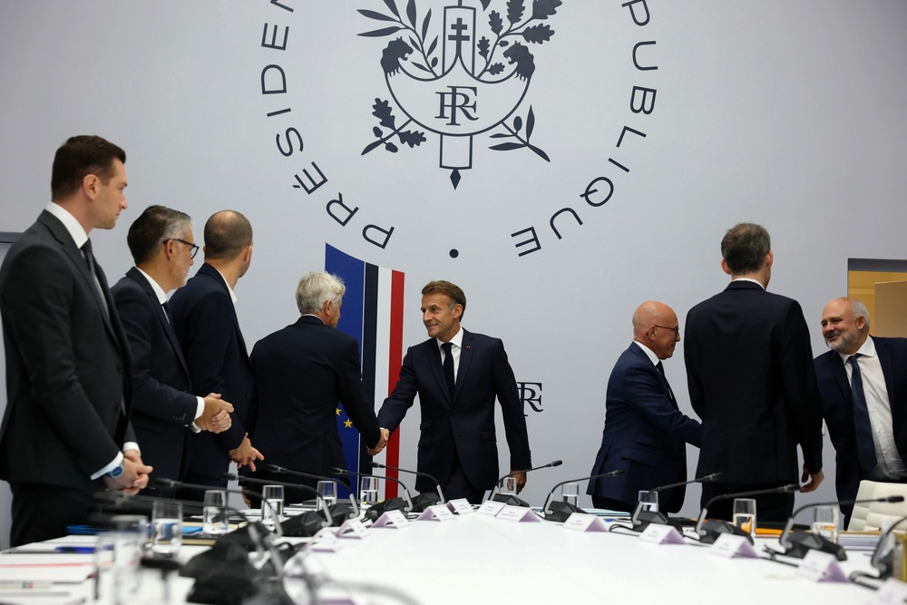 Emmanuel Macron held the emergency meeting on Friday (AP)