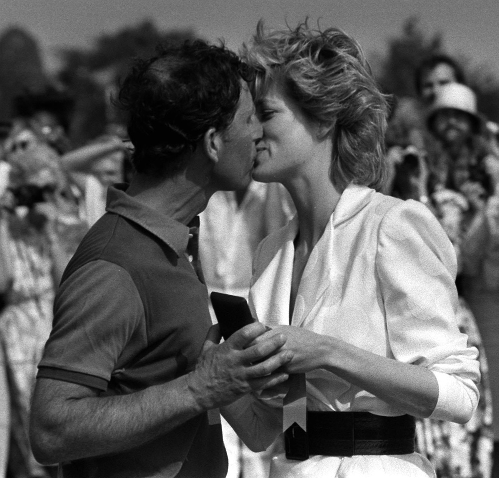 Charles receiving a kiss from Diana (Ron Bell/PA) (PA Archive)
