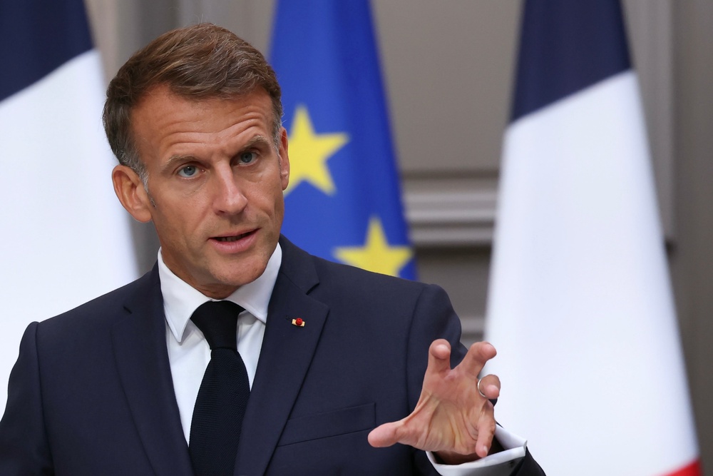 French President Emmanuel Macron gestures as he addresses the audience during a press conference following a meeting with the 2027 presidential election candidates and party leaders (AP)