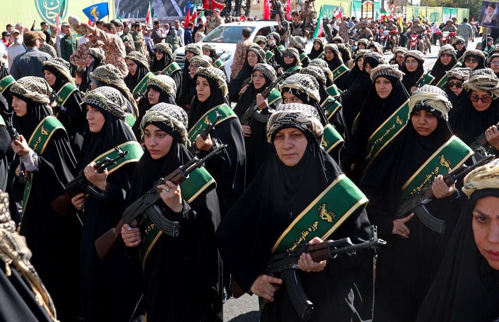 Members of Iran's Basij paramilitary force march with riffles during a military rally named Jan-Fada (those willing to sacrifice their lives) in Tehran September 18, 2026 (AFP via Getty Images)
