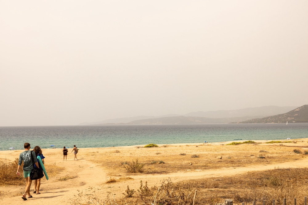 Two paths: many are happy for the extra sun, but Dr Caroline Hickman has also fielded enquiries from those who feel helpless amid a climate catastrophe (AFP/Getty)