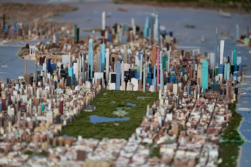 Central Park and the tall buildings of midtown Manhattan are seen on a large model of the New York City, made by Joe Macken, at the Museum of the City of New York (AP)