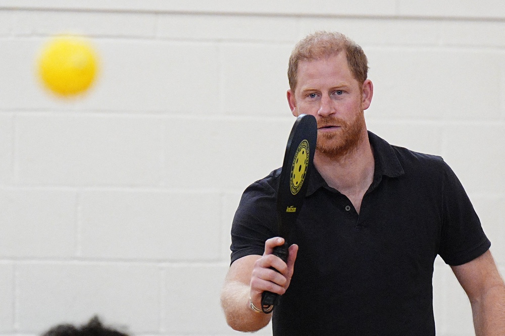 Harry played pickleball with children at a school in Birmingham on Friday (AFP/Getty)