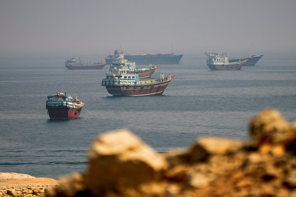 Vessels near the Strait of Hormuz, as seen from Musandam, Oman (Reuters)