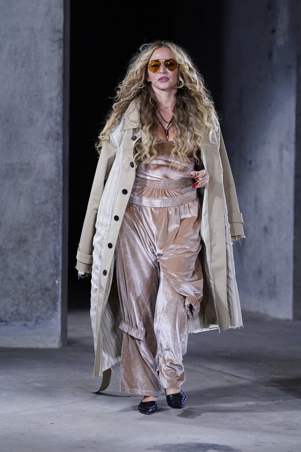 Drea de Matteo on the catwalk at the OnlyFans x Natasha Zinko show smoking a cigarette (Ian West/PA)
