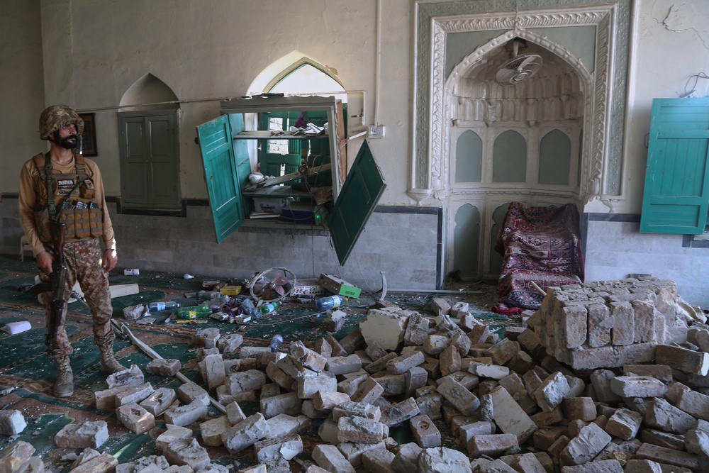 An Army soldier examines damage at the site after a bomb exploded at a mosque in Kohat, in northwestern Pakistan, Friday (Copyright 2026 The Associated Press. All rights reserved.)