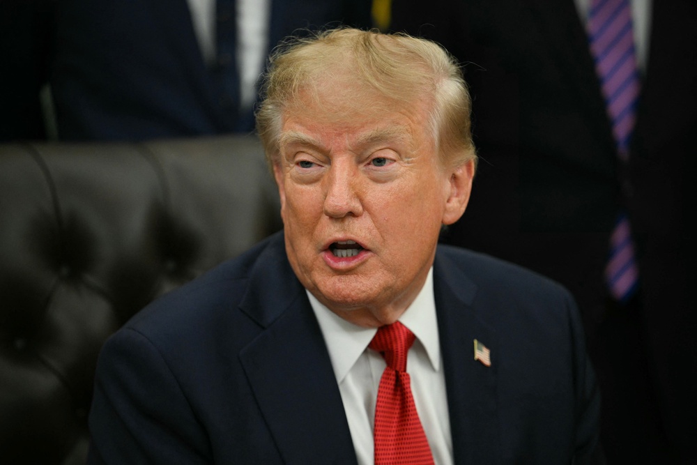 Trump, who has disputed any personal ties with Kremlev and did not attend his son’s wedding, told reporters Friday of Kremlev’s gift: ‘It's totally allowed...but as I understand it, he paid him back’ (AFP via Getty Images)