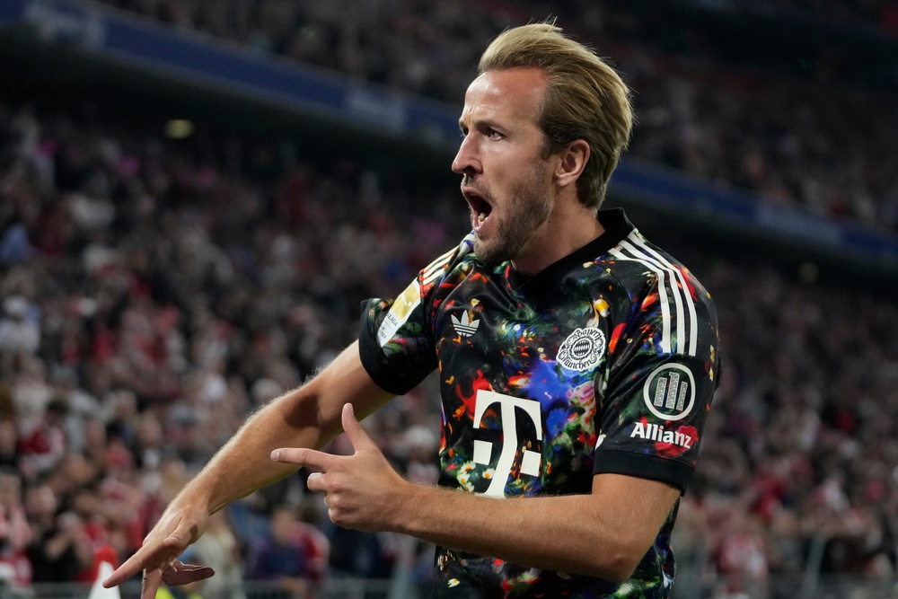 Bayern's Harry Kane celebrates after scoring his side's fourth goal between Bayern Munich and 1. FC Union Berlin (AP)