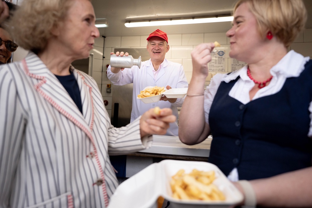 Sir Ed Davey serving up fish and chips at Brighton Palace Pier (Stefan Rousseau/PA) (PA Wire)