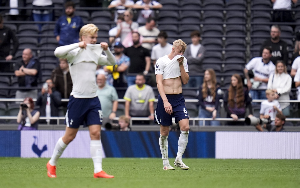 Jan Paul van Hecke and Lucas Bergvall walk off dejected (PA)