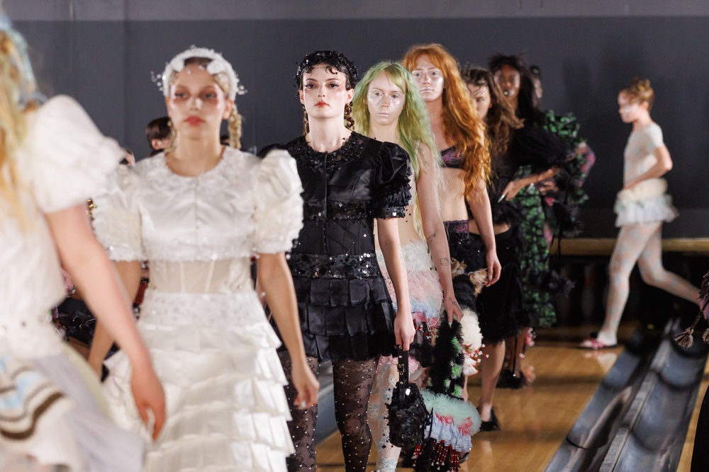 Models doing the final walk for the Copova Lowena show (Jason Lloyd Evans/PA)