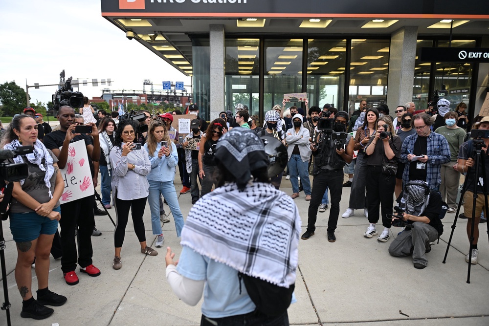 Pro-Palestinian demonstrators gather prior to a protest before an Ed Sheeran concert in Philadelphia (Allie Ippolito/AP) (AP)