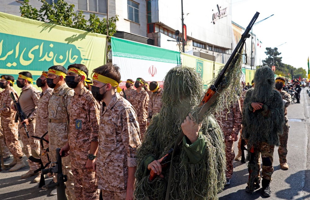 Members of Iran's Basij paramilitary force take part in a military rally named Jan-Fada (those willing to sacrifice their lives) in Tehran (AFP/Getty)