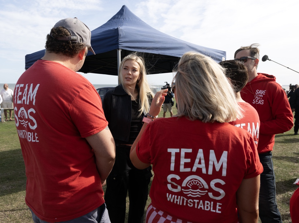 Singer Becky Hill speaks to campaigners