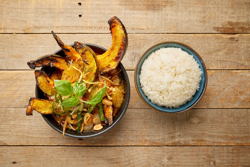 Roast pumpkin and caramelised apple bring autumn sweetness to a rich massaman curry with coconut, basil and peanuts (Sebby Holmes/Farang/Payst)