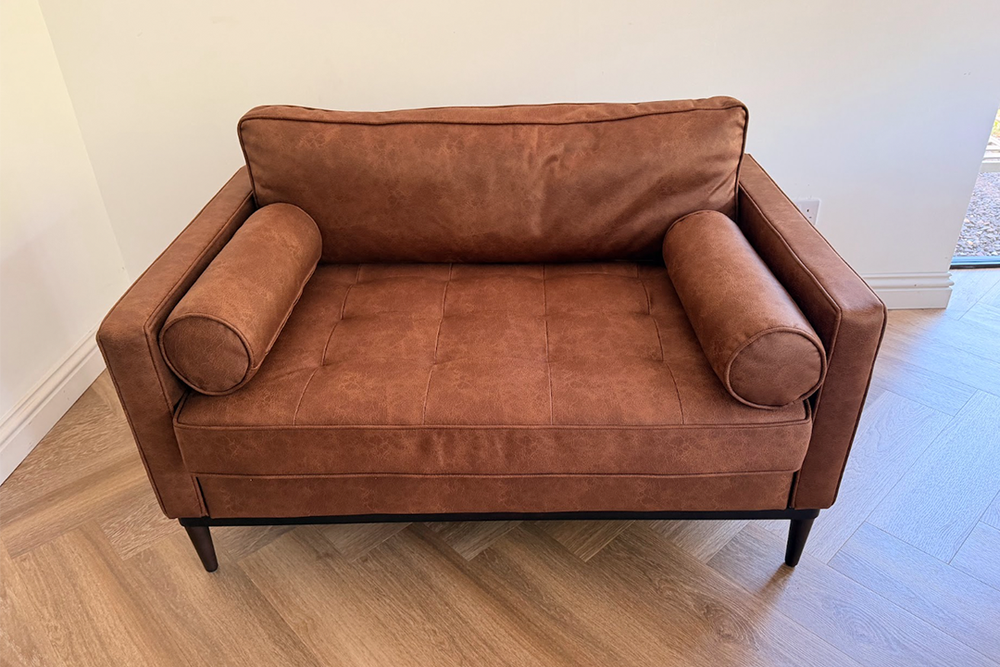 The faux leather has a subtle glossy finish (Emily Peck/The Independent)