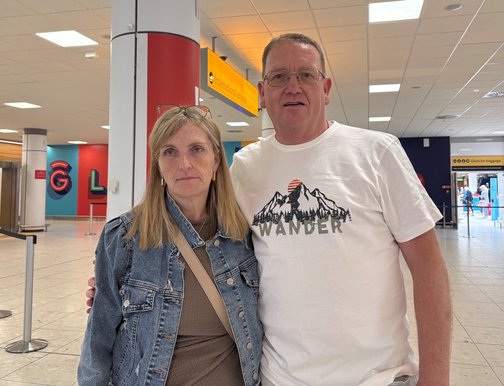 Barbara Ann Stoddart and Andrew Lithgow, who were due to fly to London Heathrow and on to Las Vegas to be married – before their flight to London was cancelled – at Glasgow Airport (Lucinda Cameron/PA) (PA Wire)
