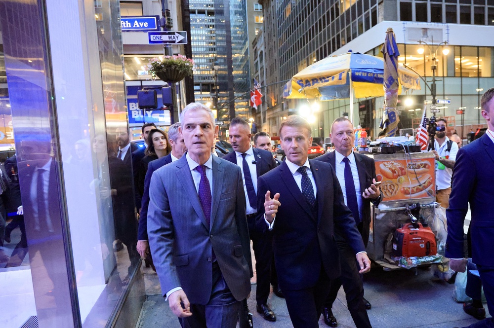 President Emmanuel Macron (R) walks with Jerome Bonnafont (L), Permanent Representative of France to the United Nations after a meeting with US President Donald Trump at Trump Tower i (AFP/Getty)