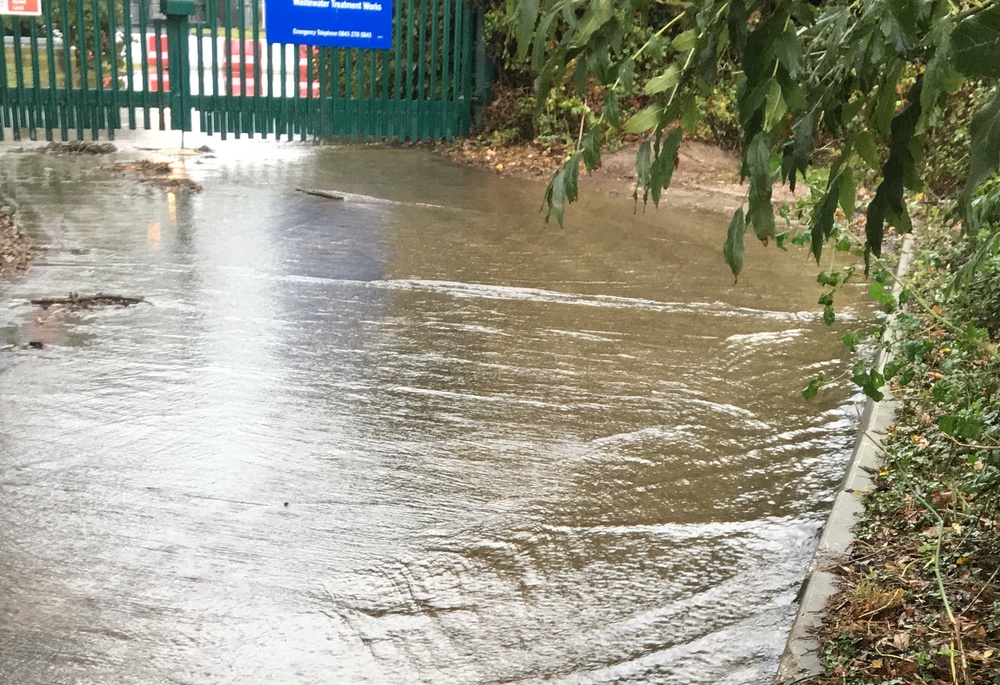 A sewage flooded street at Swalecliffe Brook in Whitstable in March 2020 (PA)
