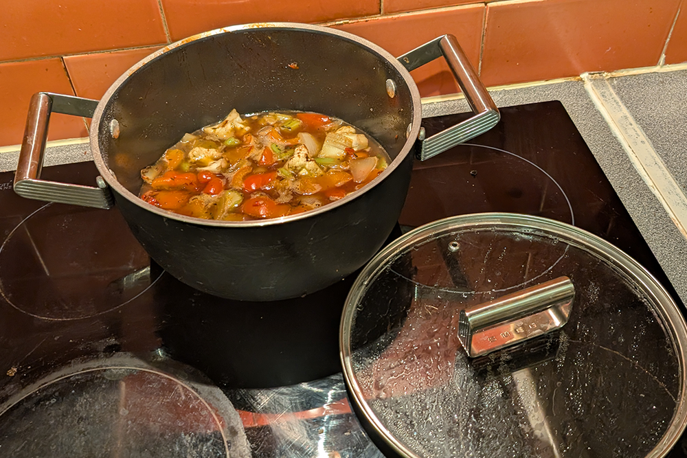 The handles didn’t get too hot to handle when cooking on the hob (Maria Mellor/The Independent)