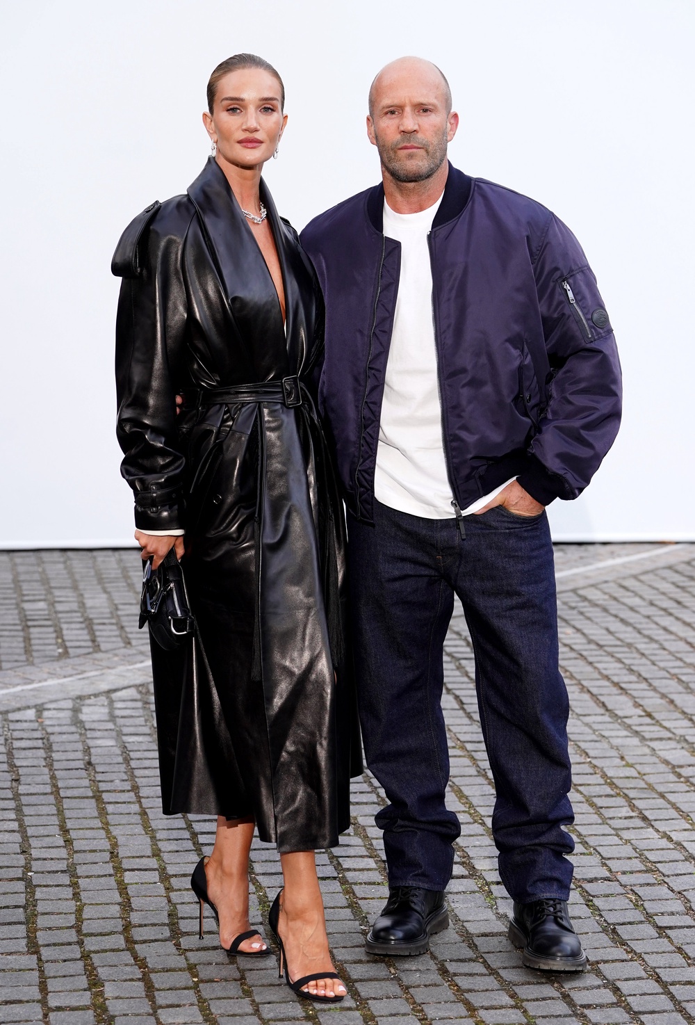 Rosie Huntington-Whiteley and Jason Statham at Burberry’s London Fashion Week show (PA)