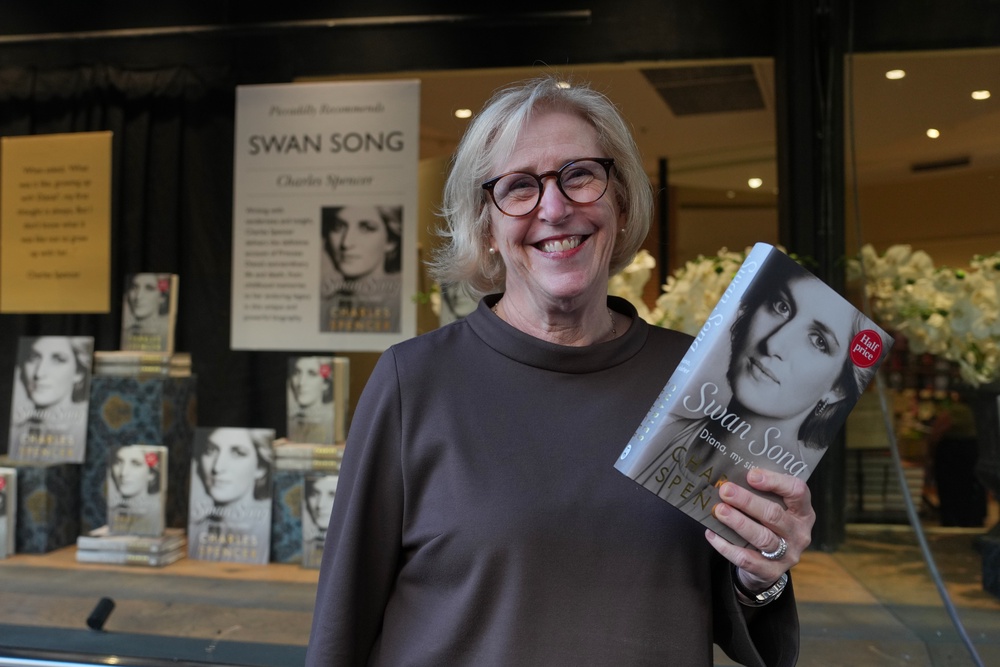 Mary Scheible was delighted to get her hands on a copy of the book (AP)