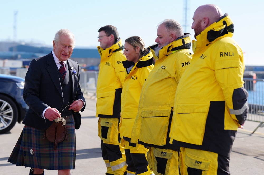Charles met RNLI volunteers during his visit to Peterhead (Jane Barlow/PA) (PA Wire)