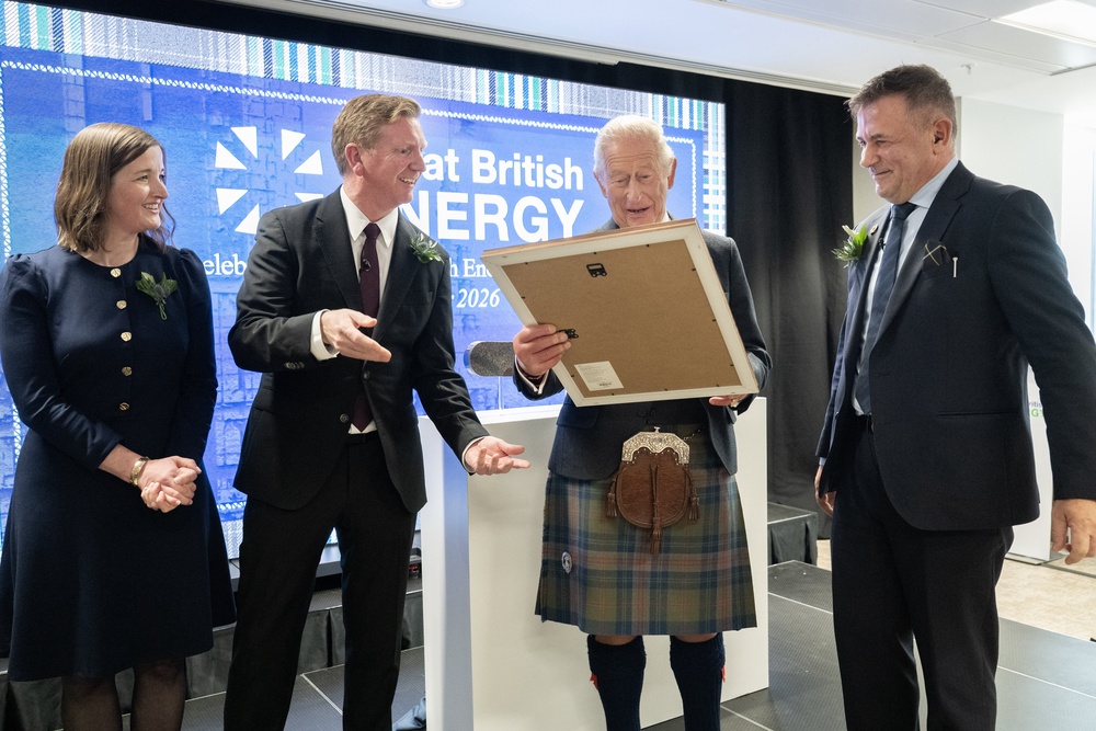 Charles was presented with a poem during his visit (Lesley Martin/PA)