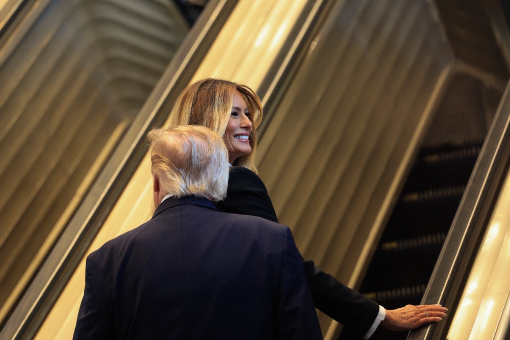 Trump concluded his brief remarks to reporters by claiming that the US was making ‘a lot of progress’ with the war in Iran, before walking to the escalator with first lady Melania Trump (AFP/Getty)