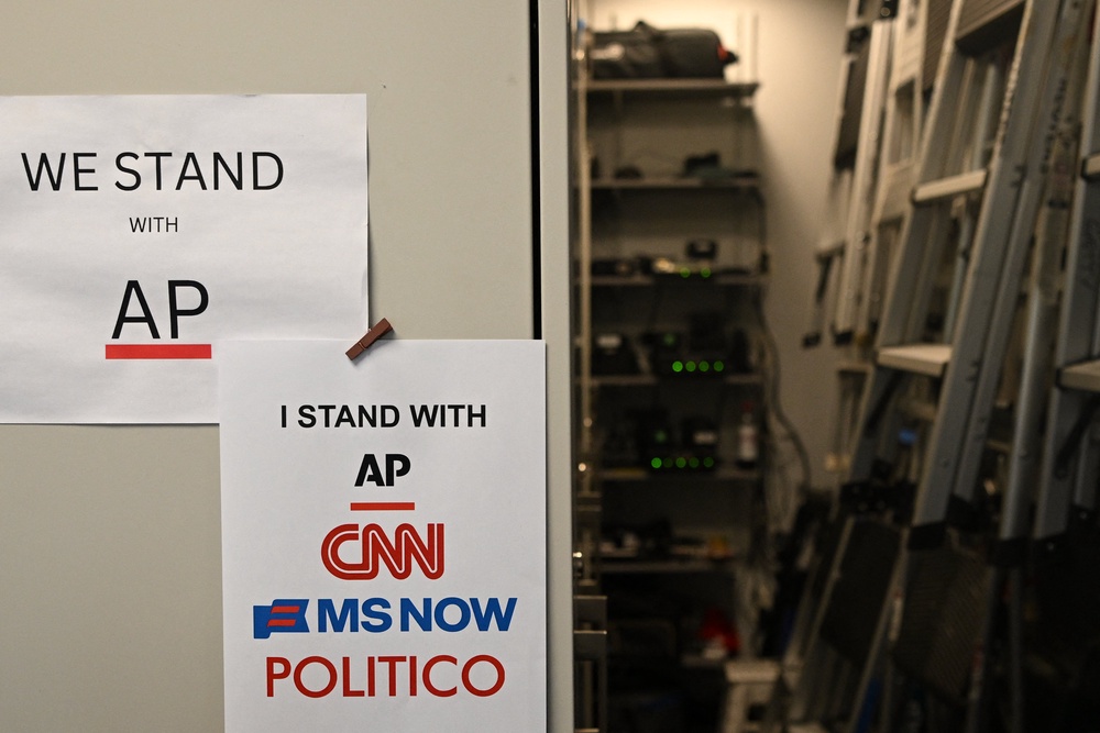 Flyers supporting the Associated Press, CNN, MS NOW and Politico hang inside of the White House briefing room in Washington, DC, on September 21, 2026. (AFP/Getty)