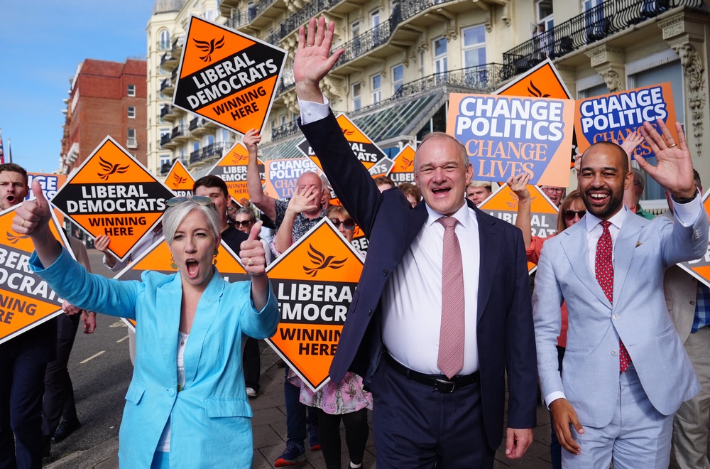Liberal Democrat leader Sir Ed Davey (centre) arriving with deputy leader Daisy Cooper (left) and Josh Babarinde for the Liberal Democrat party conference at Brighton Centre (Stefan Rousseau/PA) (PA Wire)